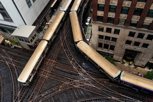 Chicago Transit Authority (CTA) L trains in the Loop neighborhood of Chicago, Illinois, US, on Thursday, Aug. 15, 2024. Roughly 50,000 people are expected in Chicago for the DNC, and local leaders are keen to buff up Chicago’s pandemic-dinged image as Chicago’s transit system overall ridership sat at 60% of pre-pandemic passenger levels at the start of 2024. Photographer: Al Drago/Bloomberg via Getty Images