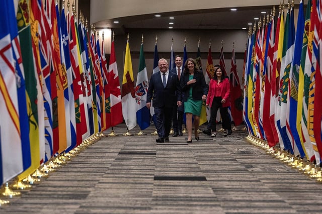 Premier of Ontario Doug Ford, left ,and Premier of Alberta Danielle Smith enter the First Minister’s Meeting in Saskatoon on Monday, June 2, 2025. THE CANADIAN PRESS/Liam Richards