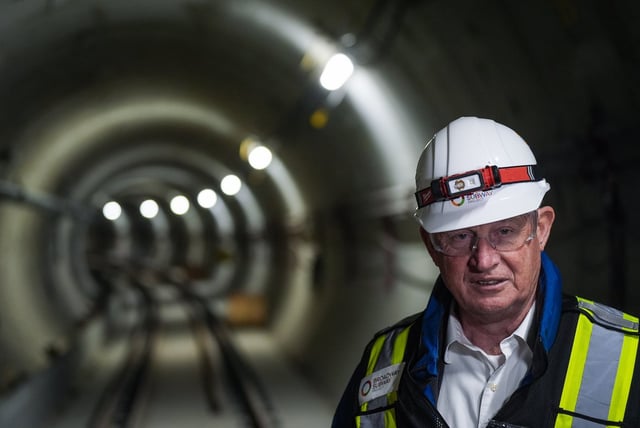 B.C. minister of transportation and transit Mike Farnworth listens while standing in a tunnel at the future Great Northern Way-Emily Carr station during a tour of construction taking place for the Broadway Subway Project, in Vancouver, on Monday, June 2, 2025. The project includes six underground stations and is a 5.7 kilometre extension of the Millennium SkyTrain line, connecting VCC-Clark Station to the new Broadway-Arbutus station in the city's Kitsilano neighbourhood. THE CANADIAN PRESS/Darryl Dyck