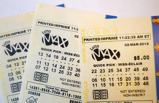 Lotto Max tickets are shown in Toronto on Monday, Feb. 26, 2018. THE CANADIAN PRESS