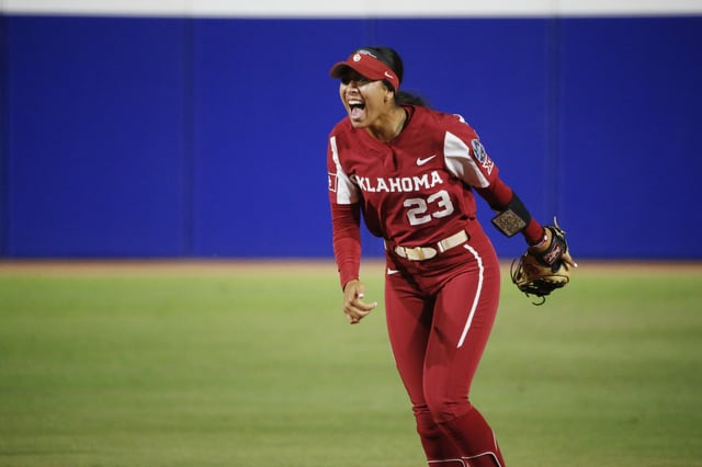 Tiare Jennings #23 of the Oklahoma Sooners celebrates after turning a double play in the second inning against the Florida State Seminoles during Game One of the NCAA Division 1 Softball Championship at USA Softball Hall of Fame Stadium on June 07, 2023 in Oklahoma City, Oklahoma.