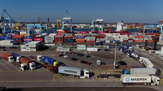 A drone view shows shipping containers and lorries at Dublin Port, in Dublin, Ireland April 2, 2025. REUTERS/Clodagh Kilcoyne/File Photo
