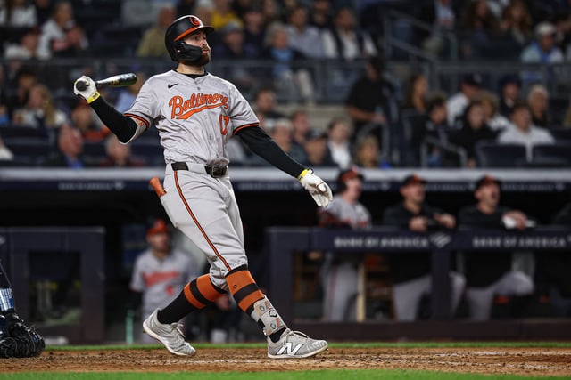 Sep 24, 2024; Bronx, New York, USA; Baltimore Orioles left fielder Colton Cowser (17) hits a solo home run during the eighth inning against the New York Yankees at Yankee Stadium. Mandatory Credit: Vincent Carchietta-Imagn Images