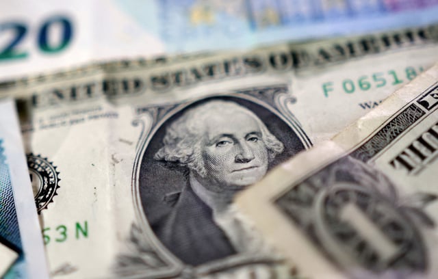 U.S. dollar banknotes are seen in this illustration taken May 4, 2025. REUTERS/Dado Ruvic/Illustration/File Photo
