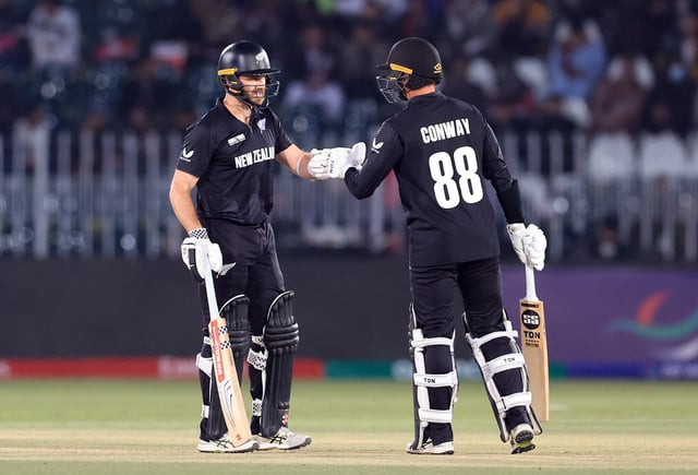 Cricket - ICC Men's Champions Trophy - Group A - New Zealand v Bangladesh - Rawalpindi Cricket Stadium, Rawalpindi, Pakistan - February 24, 2025 New Zealand's Kane Williamson bumps fists with Devon Conway. REUTERS/Akhtar Soomro/File Photo