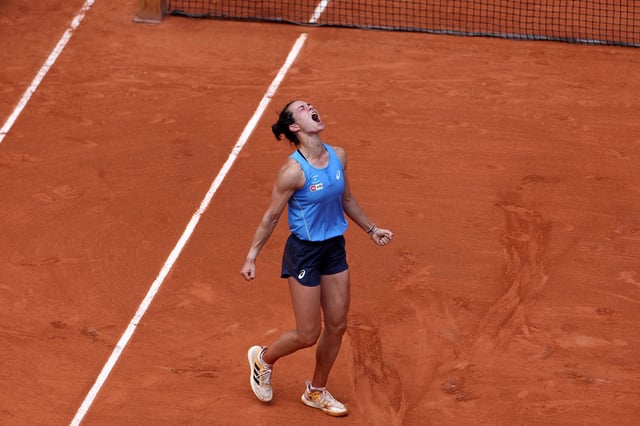 France's Lois Boisson celebrates after winning her women's singles match against US Jessica Pegula on day 9 of the French Open tennis tournament on Court Philippe-Chatrier at the Roland-Garros Complex in Paris on June 2, 2025.