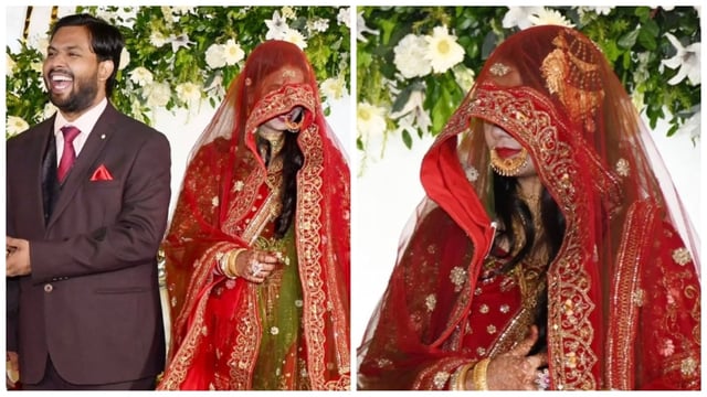 Khan Sir poses with his wife, AS Khan, during their wedding reception. 