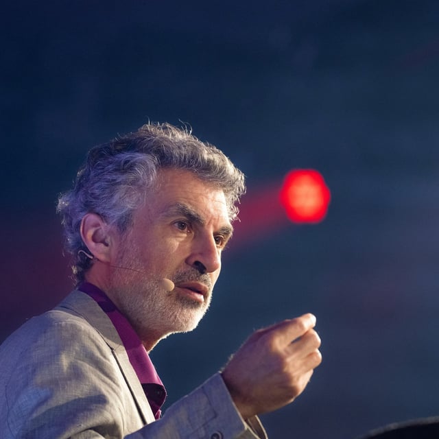 Several Canadian pioneers in artificial intelligence have signed a new document urging governments to better manage the technology's risks as its capabilities continue to advance rapidly. Yoshua Bengio, founder and scientific director, Mila-Quebec AI Institute, discusses artificial intelligence, democracy and the future of civilization at the C2MTL conference, in Montreal, Wednesday May 24, 2023. THE CANADIAN PRESS/Christinne Muschi