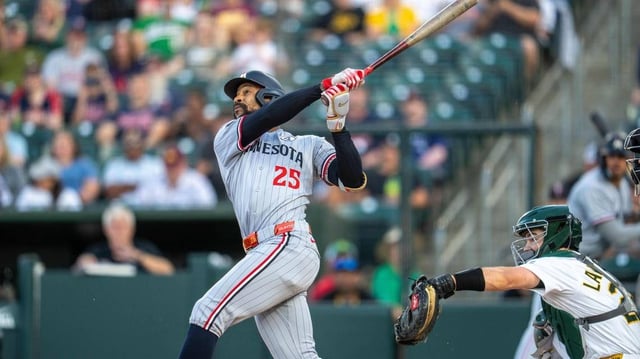 Jun 2, 2025; West Sacramento, California, USA; Minnesota Twins center fielder Byron Buxton (25) hits a two run RBI double against the Athletics during the second inning at Sutter Health Park. Mandatory Credit: Neville E. Guard-Imagn Images