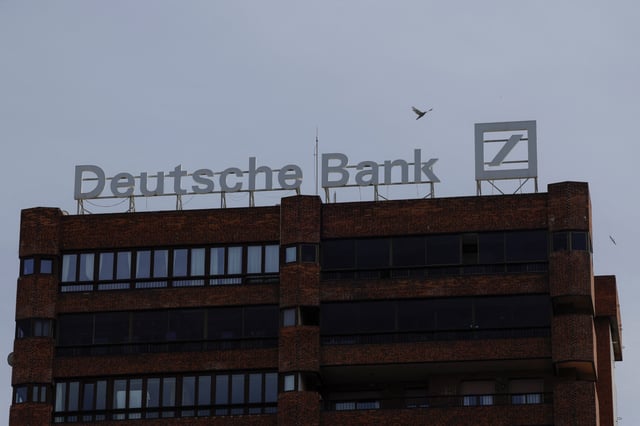 The logo of Deutsche Bank is seen on the roof of a building outside a Deutsche Bank branch office in Malaga, Spain, April 24, 2024. REUTERS/Jon Nazca/File Photo
