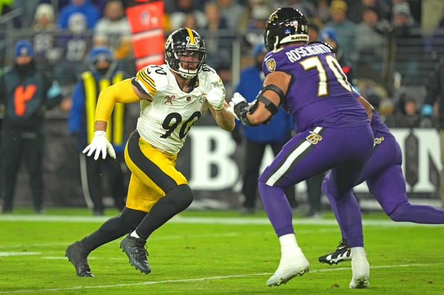 Dec 21, 2024; Baltimore, Maryland, USA; Pittsburgh Steelers linebacker T.J. Watt (90) rushes in the second quarter against Baltimore Ravens tackle Roger Rosengarten (70) at M&T Bank Stadium. Mandatory Credit: Mitch Stringer-Imagn Images/File Photo