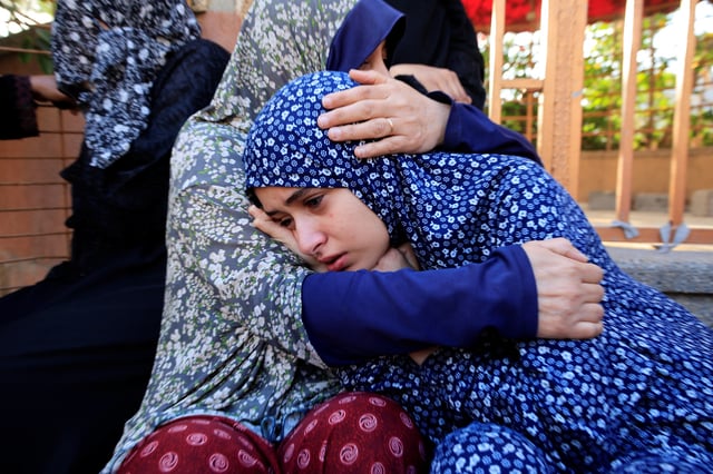 Women react following the death of Palestinians, in what the Gaza health ministry say was Israeli fire near a distribution site in Rafah, at Nasser hospital in Khan Younis, in the southern Gaza Strip, June 3, 2025. REUTERS/Hatem Khaled
