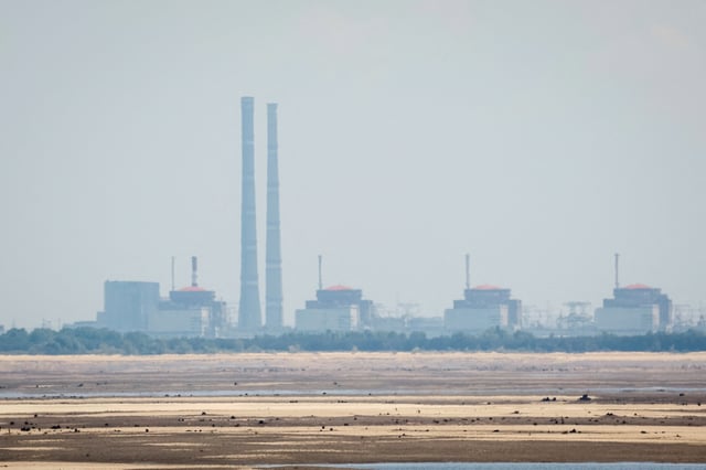 A view shows Zaporizhzhia Nuclear Power Plant from the bank of Kakhovka Reservoir near the town of Nikopol after the Nova Kakhovka dam breached, amid Russia's attack on Ukraine, in Dnipropetrovsk region, Ukraine June 16, 2023. REUTERS/Alina Smutko/File Photo