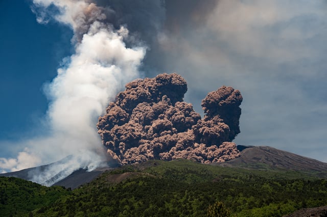 Volcanic steam rises from Mount Etna, as seen from Milo, Italy, June 2, 2025. REUTERS/Marco Restivo/ File Photo