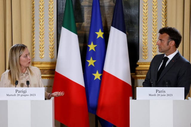 French President Emmanuel Macron and Italy's Prime Minister Giorgia Meloni deliver remarks at the Elysee Palace in Paris, France, on June 20, 2023. LUDOVIC MARIN/Pool via REUTERS/File Photo
