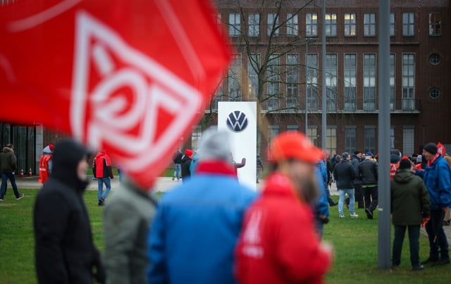 Employees of German car maker Volkswagen (VW)