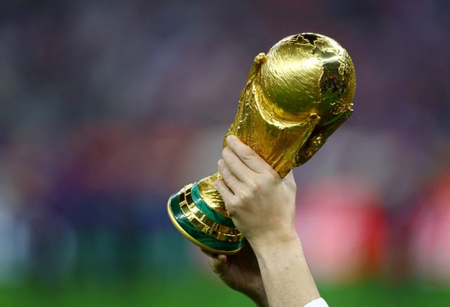 Soccer Football - FIFA World Cup Qatar 2022 - Final - Argentina v France - Lusail Stadium, Lusail, Qatar - December 18, 2022  General view of the World Cup trophy during the closing ceremony before the match REUTERS/Hannah Mckay/File Photo