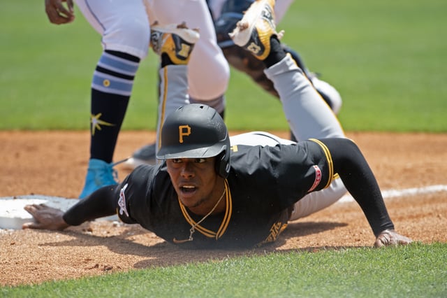 TAMPA, FLORIDA - APRIL 2: Ke&#39;Bryan Hayes #13 of the Pittsburgh Pirates is thrown out at third base during the second inning of a game against the Tampa Bay Rays at George M. Steinbrenner Field on April 2, 2025 in Tampa, Florida.