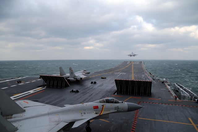 Chinese fighter jets launch from the aircraft carrier CNS Liaoning during a military exercise in the Yellow Sea off China&#39;s east coast on December 23, 2016.