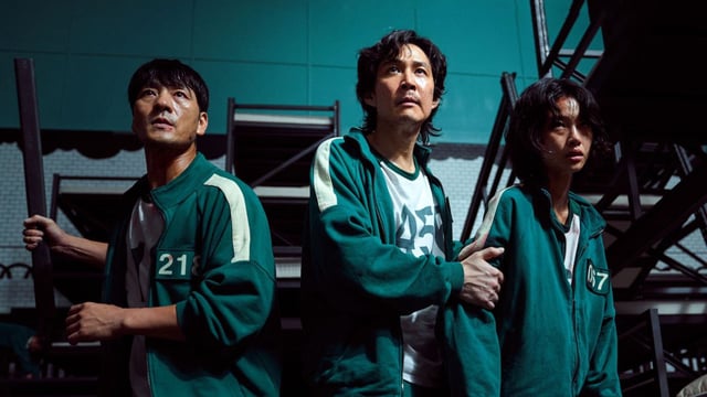 Players 218, 456, and 067 in the dorm room in Squid Game Season 1