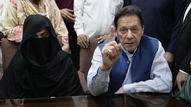 Pakistan’s former Prime Minister Imran Khan, right, and Bushra Bibi, his wife. File. | Photo Credit: AP