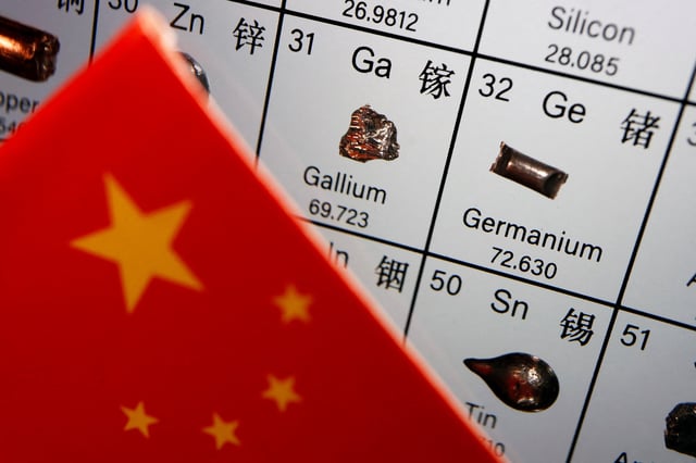 The flag of China is placed next to the elements of Gallium and Germanium on a periodic table, in this illustration picture taken on July 6, 2023. REUTERS/Florence Lo/Illustration/File Photo