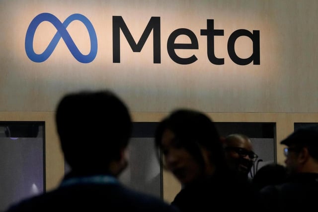 FILE – Attendees visit the Meta booth at the Game Developers Conference in San Francisco on March 22, 2023. (AP Photo/Jeff Chiu, File)