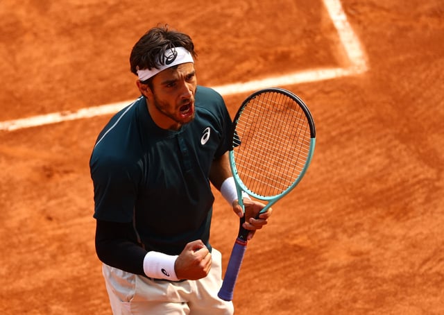 Tennis - French Open - Roland Garros, Paris, France - June 3, 2025 Italy's Lorenzo Musetti celebrates during his quarter final match against Frances Tiafoe of the U.S. REUTERS/Lisi Niesner