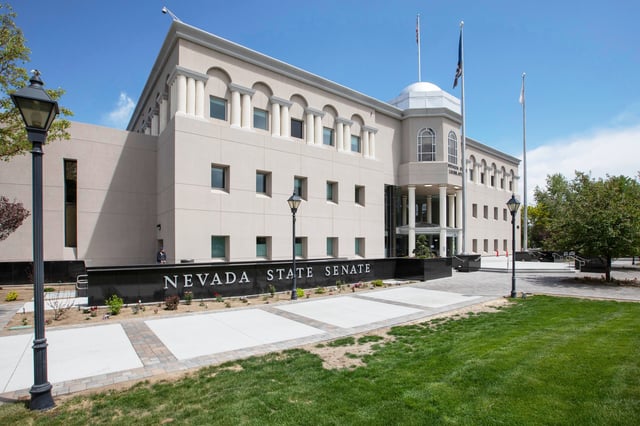 FILE - Blue skies sit above he Nevada Legislature building in Carson City, Nev., Tuesday, May 30, 2023. (AP Photo/Tom R. Smedes, File)