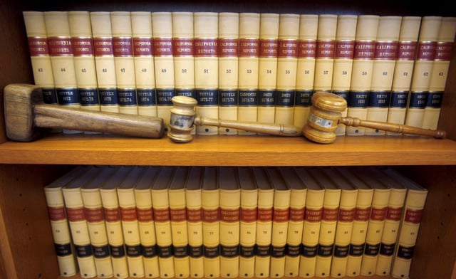 In this July 14, 2010, file photo, gavels and law books are shown in the office of California Supreme Court Chief Justice Ronald George at his office in San Francisco, California.