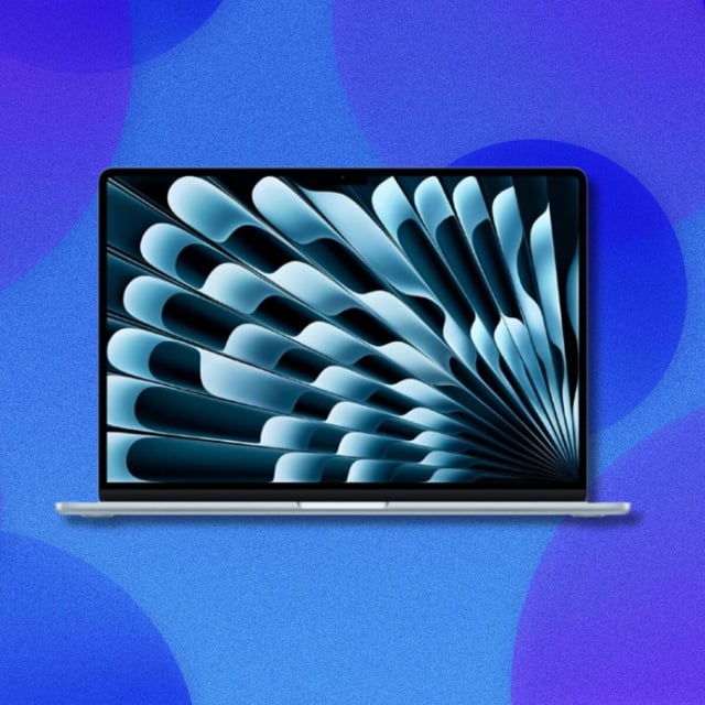 a macbook air m4 laptop on a blue background with blue circles
