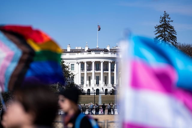In this March 1 photo, people protest outside the White House in Washington, DC.