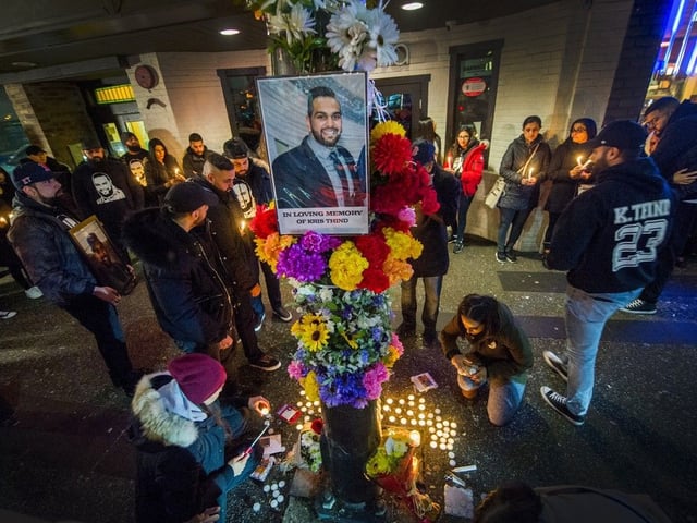  Family and friends attend a vigil for Kalwinder (Kris) Thind outside Cabana Lounge nightclub on Granville Street in Vancouver, B.C., Jan. 27, 2019. Thind died Jan. 27, 2018 after intervening in a fight outside the club where he worked as a nightclub promoter.