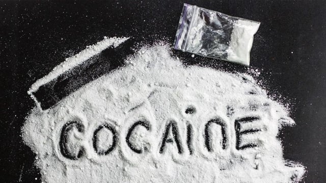 Four packets containing 5,194 grams (5.194 kgs) of cocaine were found during search, said an official.