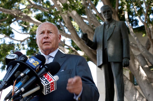 Thomas Girardi talks to reporters after the reading of the verdict in Bryan Stow's suit against former Los Angeles Dodgers owner Frank McCourt on July 9, 2014.