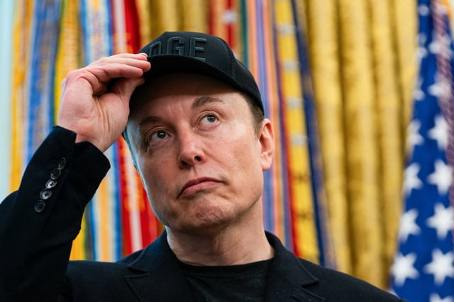 Elon Musk looks on during a news conference with President Donald Trump in the Oval Office on May 30, 2025.          