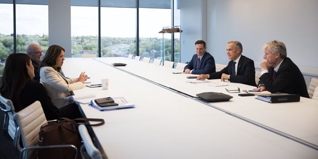 Mark Carney and his team meeting with Danielle Smith and her team.
