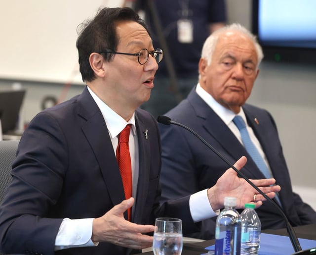 University of Florida president-elect Santa Ono answers a question during a meeting of the Florida Board of Governors in Orlando, Tuesday, June 3, 2025, as Mori Hosseini, right, chairman of the UF Board of Trustees, listens. The governors’ board met at the University of Central Florida’s downtown campus in Orlando to vote on Ono becoming Florida’s 14th president.  (Joe Burbank/Orlando Sentinel)