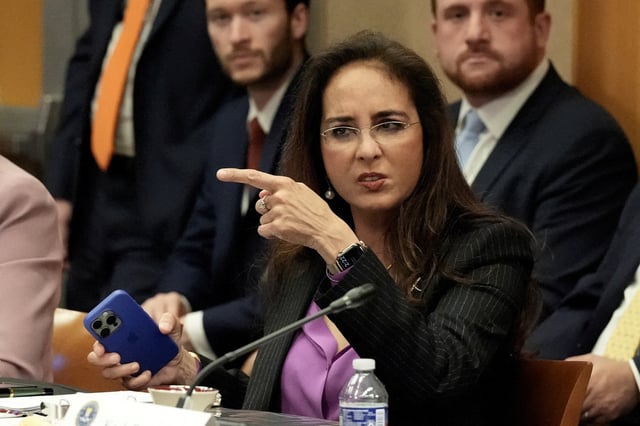 Assistant Attorney General for Civil Rights Harmeet Dhillon gestures while attending a meeting of the Eradicating Anti-Christian Bias Task Force, at the Justice Department in Washington, D.C., U.S., April 22, 2025. REUTERS/Ken Cedeno/File Photo