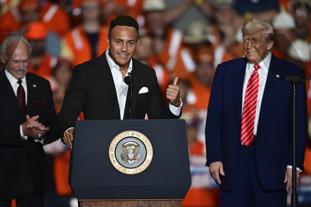 Pittsburgh Steelers Miles Killebrew speaks as former Pittsburgh Steelers Rocky Bleier, and President Donald Trump listen at the U.S. Steel Mon Valley Works-Irvin plant, Friday, May 30, 2025, in West Mifflin, Pa. (AP Photo/David Dermer)