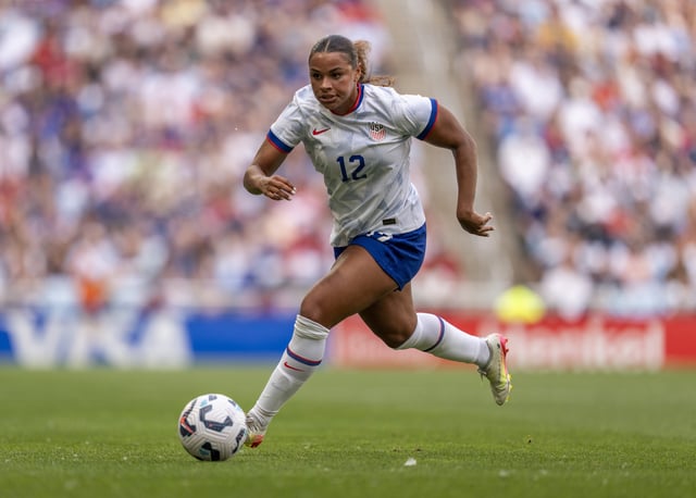 Michelle Cooper #12 of the United States dribbles during a game between China PR and USWNT at Allianz Field on May 31, 2025 in Saint Paul, Minnesota.