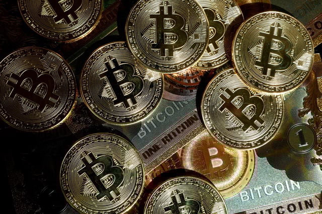 Representations of cryptocurrency bitcoin are seen in this illustration picture created in Paris, France, March 9, 2024. REUTERS/Benoit Tessier/Illustration/File Photo