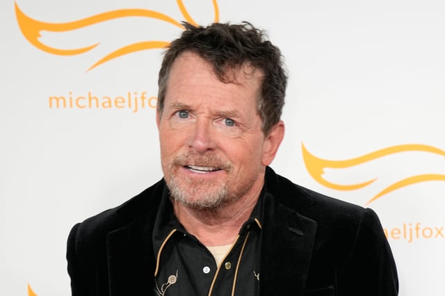 FILE - Michael J. Fox arrives at A Country Thing Happened On The Way To Cure Parkinson's in Nashville, Tenn., on April 26, 2023. (AP Photo/George Walker IV, File)