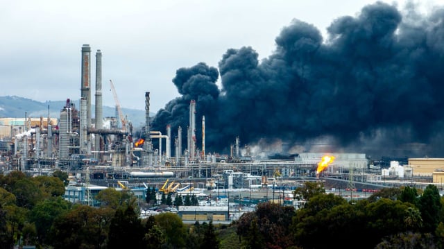 Smoke billows from a fire at Martinez Refining Company on Feb. 1.