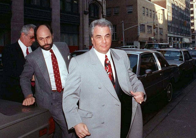 John Gotti, right, arrives at court in Manhattan on Feb. 9, 1990.