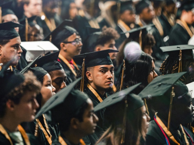 Crowd of Graduates in Academic Gowns