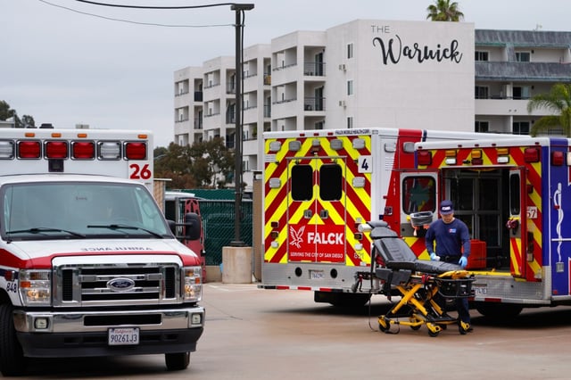 Ambulances from Falck and AMR were parked in the driveway of the Emergency &amp; Trauma Center at Scripps Mercy Hospital in San Diego on Tuesday, June 3, 2025. (Nelvin C. Cepeda / The San Diego Union-Tribune)
