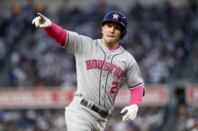 NEW YORK, NY - MAY 14: Alex Bregman #2 of the Houston Astros reacts after hitting a grand slam in the frst inning against the New York Yankees in Game 2 on May 14, 2017 at Yankee Stadium in the Bronx borough of New York City.