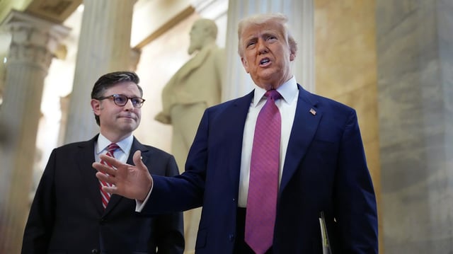 President Trump arrives with Speaker of the House Mike Johnson (R-LA) for a House Republican meeting at the U.S. Capitol on May 20. Photo by Kevin Dietsch/Getty Images