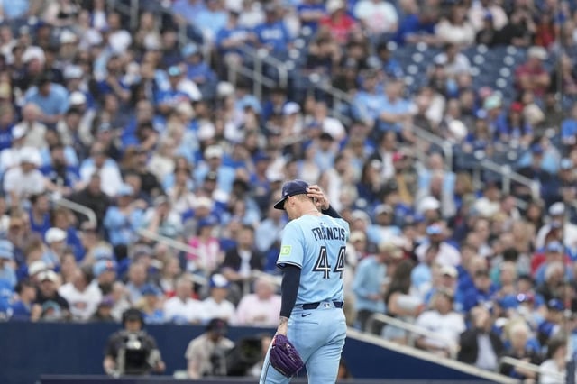 Blue Jays pitcher Bowden Francis (44) walks back to the dugout in the second inning of a Major League Baseball game against the Philadelphia Phillies on Tuesday, June 3, 2025 in Toronto. THE CANADIAN PRESS/Chris Young